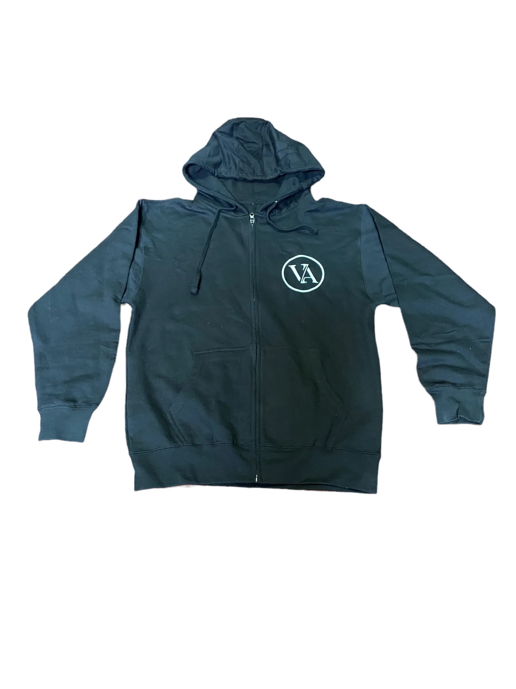 Black full-zip Villain Academy hoodie with the circled VA roundel at the left chest